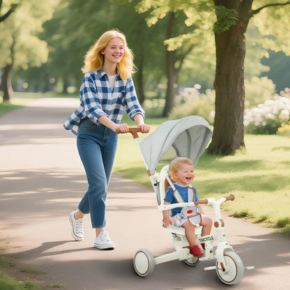 7 in 1 Toddler Tricycle, Safety Harness, Adjustable Parent Handle, Cream White Tricycles for Kids at Gallery Canada