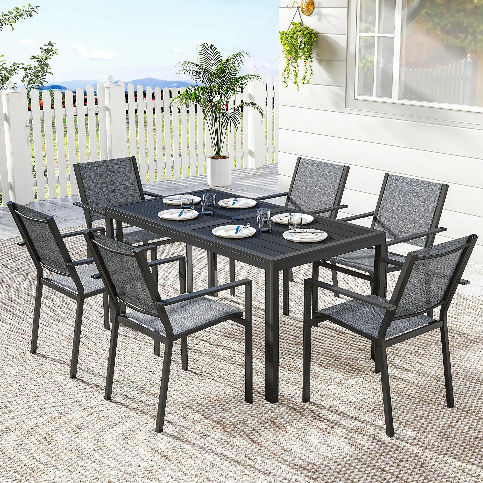 Outdoor Dining Set For 6, Black Metal Patio Table, Mesh Stackable Chairs, Black Outdoor Dining Sets at Gallery Canada