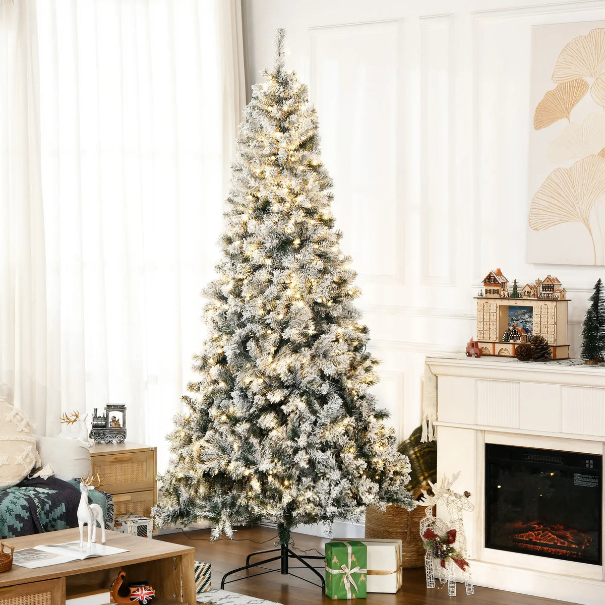 7.5ft Prelit Artificial Christmas Tree, Snow Flocked, Metal Base, Warm White LED Pre Lit Christmas Trees at Gallery Canada